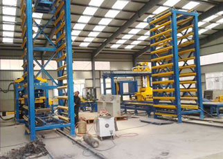 全自動(dòng)水泥制磚機(jī)配自動(dòng)收磚線可一氣呵成